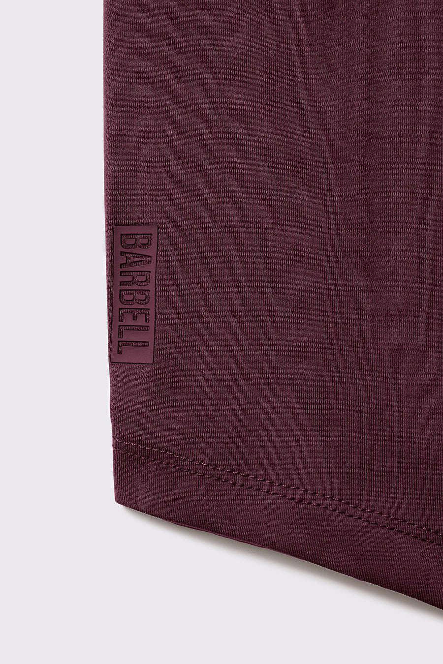 Fitted Drop Hem Long Sleeve - Currant - photo from detail flat lay #color_currant