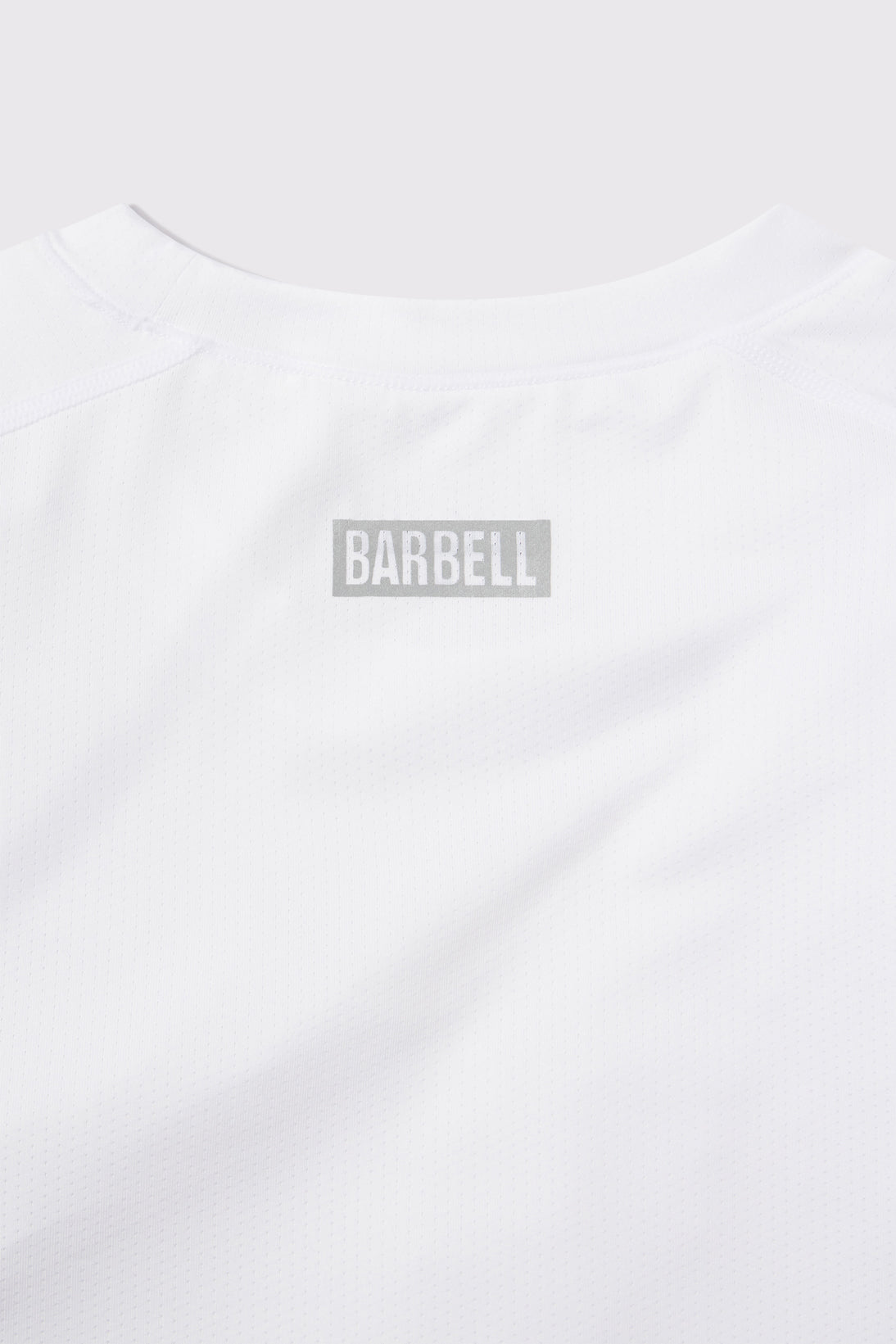 Ultralight Muscle Tank - White - photo from collar detail #color_white