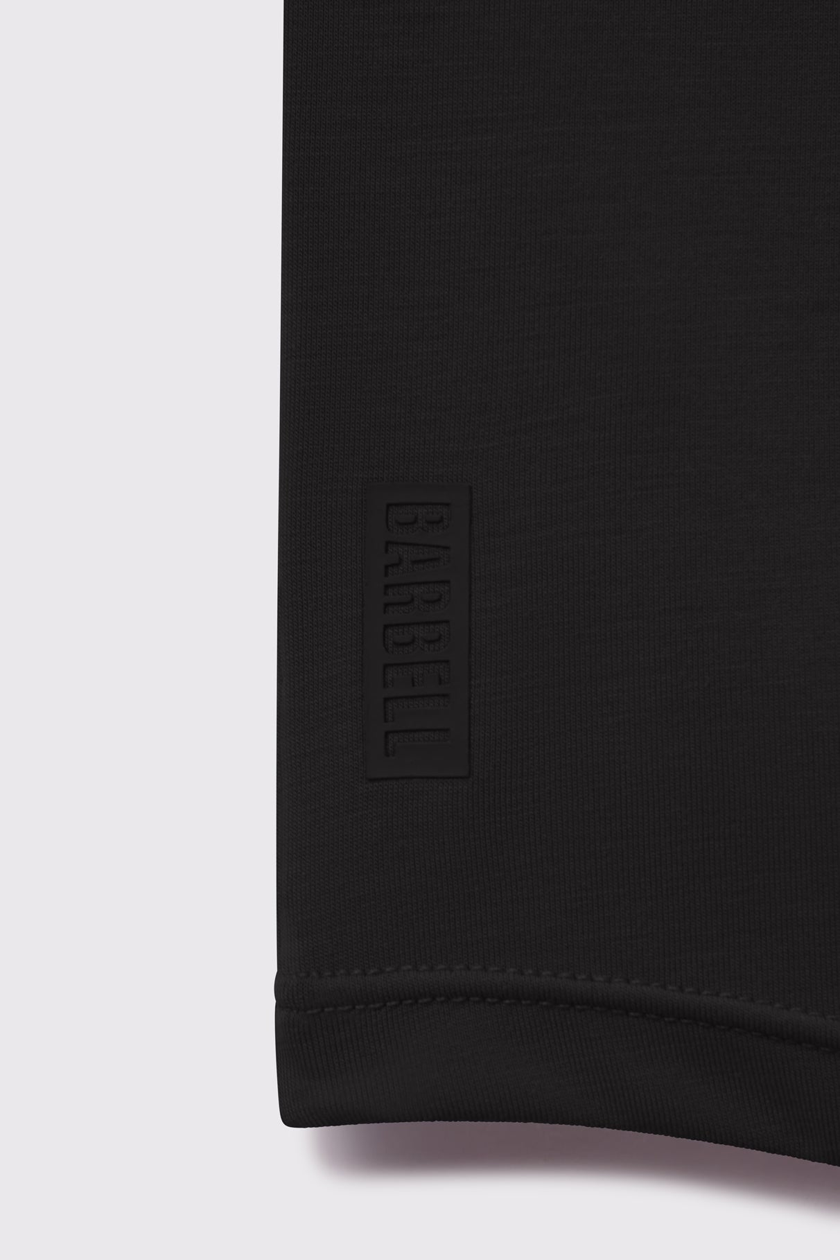 Arid Drop Hem Long Sleeve - Black - photo from logo detail #color_black