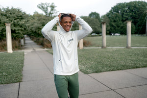 Barbell Hoodie Cream on model outdoors