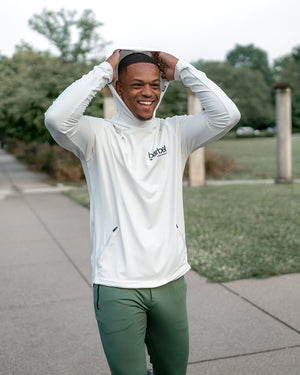 Barbell Hoodie Cream on model outdoors