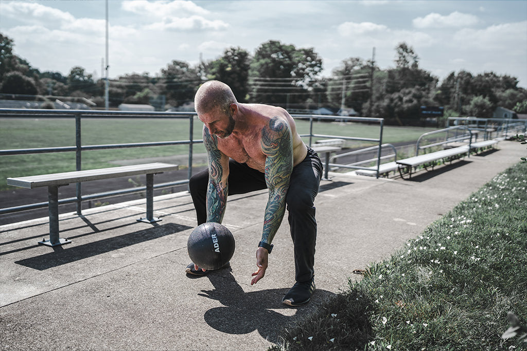 Man working out with medicine ball