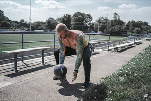 Man working out with medicine ball