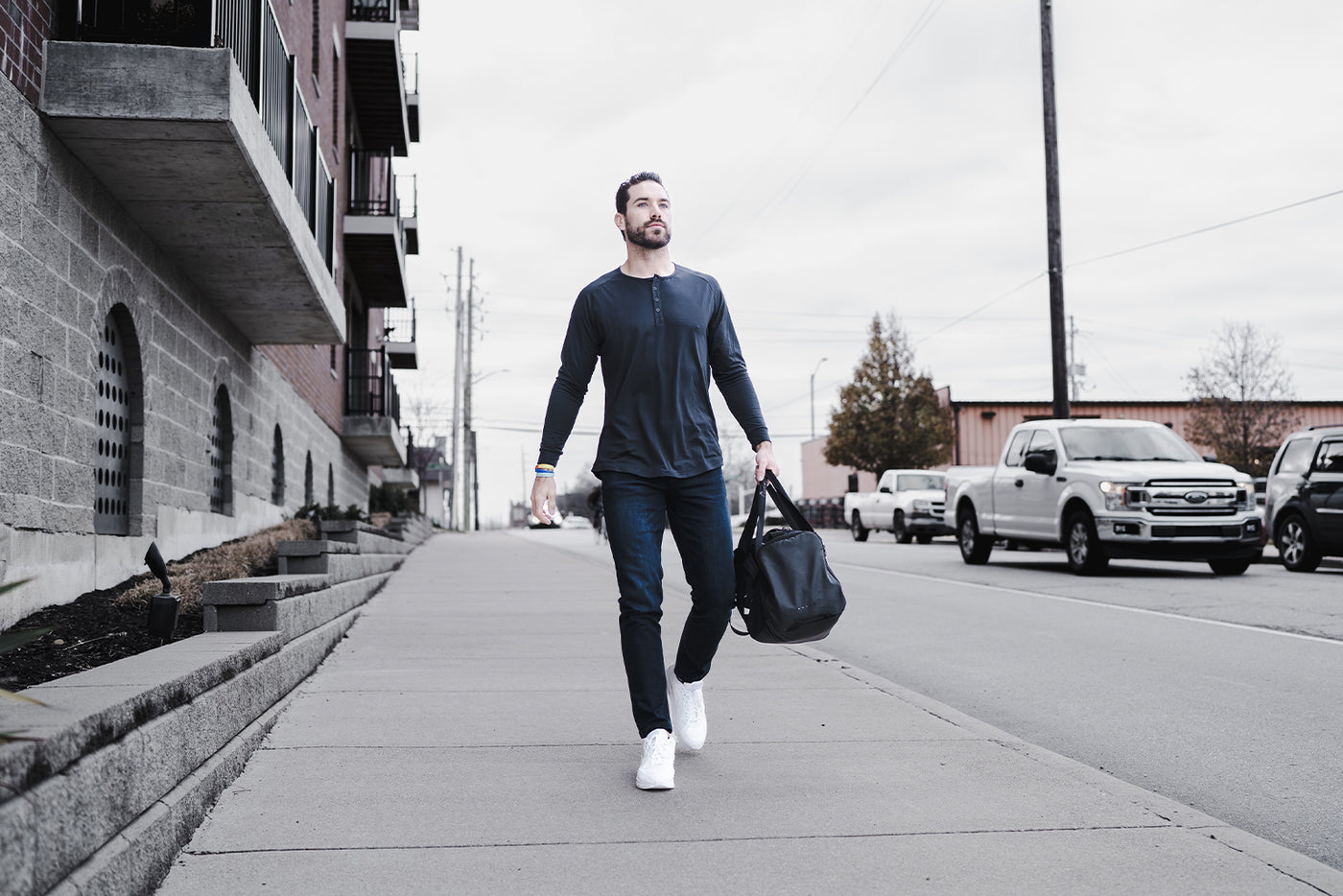 Model Reece wearing barbell Henley and Straight Athletic Fit Jeans