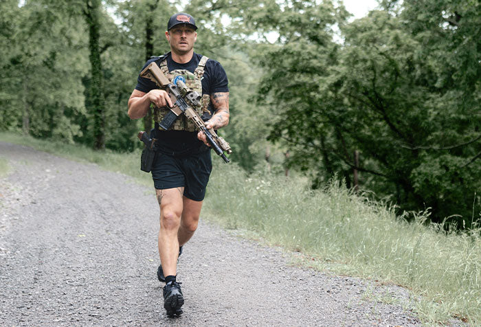 Model wearing adapt carry shorts outdoors
