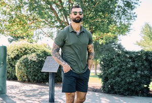 Barbell Polo and Shorts outdoors in park