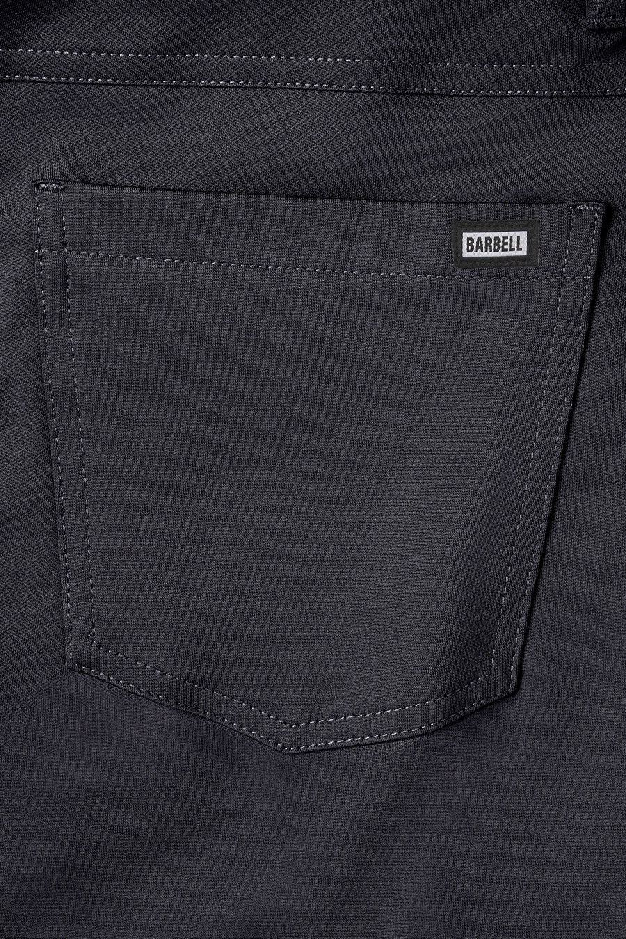 Anything Pant Slim - Navy - photo from back pocket detail #color_navy