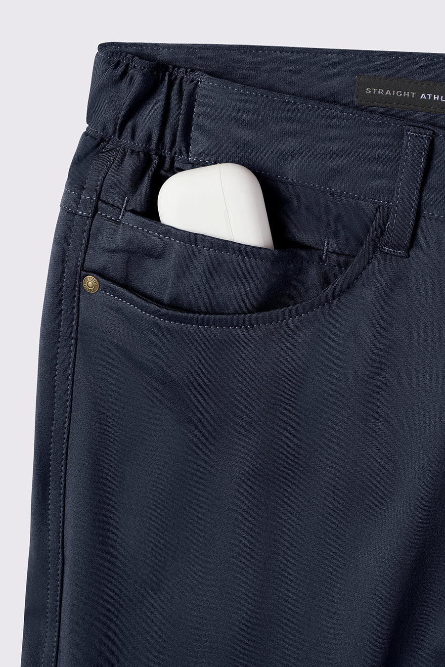 Anything Pant Slim - Navy - photo from detail flat lay #color_navy