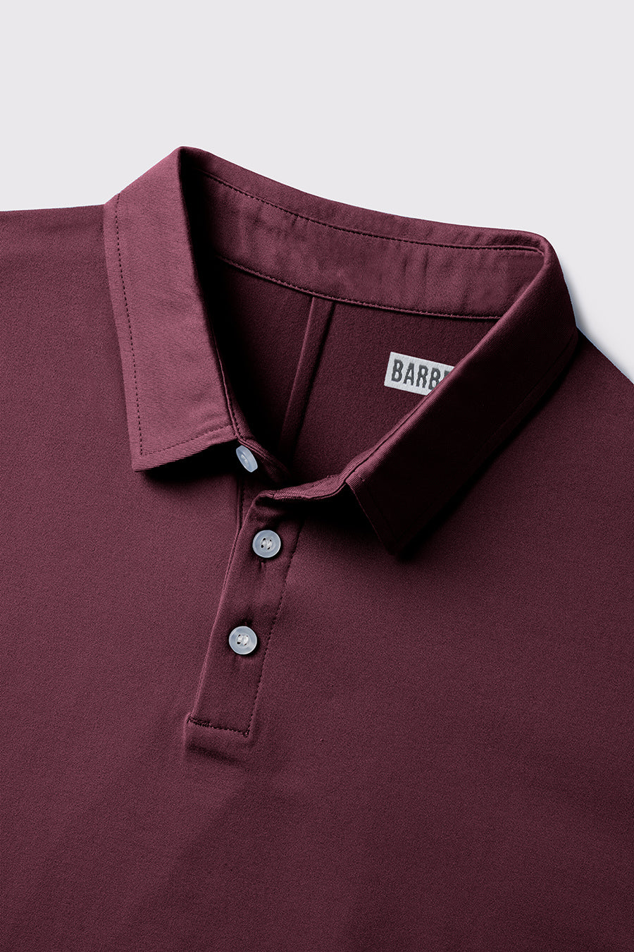 Havok Polo -Currant - photo from front button detail #color_currant