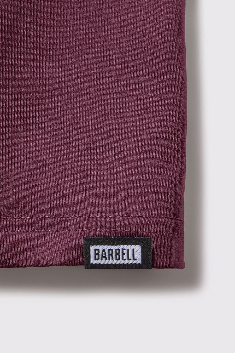Havok Short Sleeve - Currant - photo from detail flat lay #color_currant