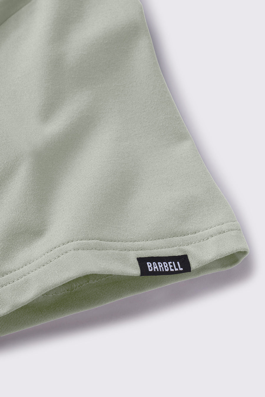 Havok Short Sleeve - Moss - photo from detail flat lay #color_moss