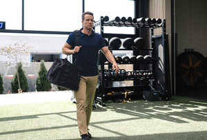 Model wearing Anything Dress Pants and Ultralight Polo Cadet