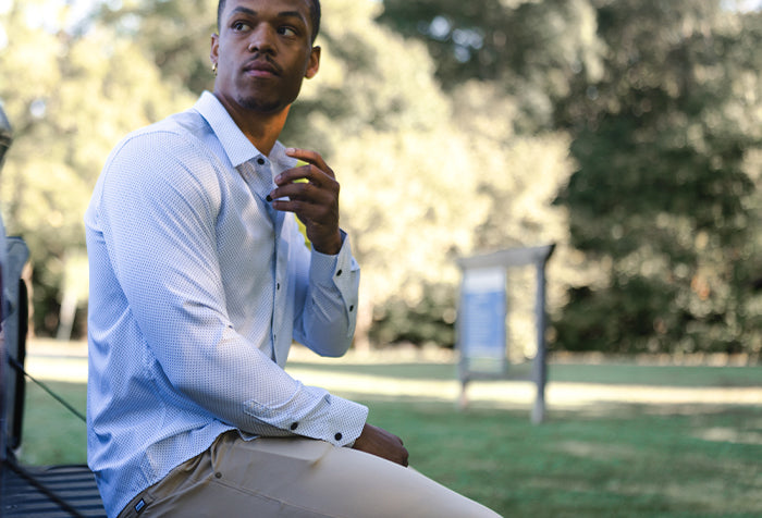 Man wearing Barbell Motive Dress Shirt outdoors in park