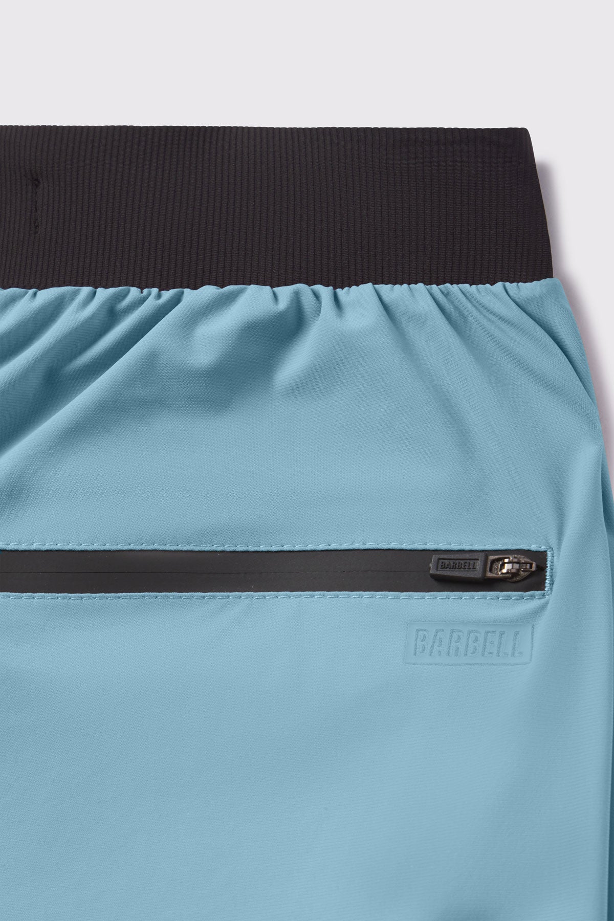 Ultralight Jogger -Pacific Blue- photo from zipper detail flat lay #color_pacific-blue